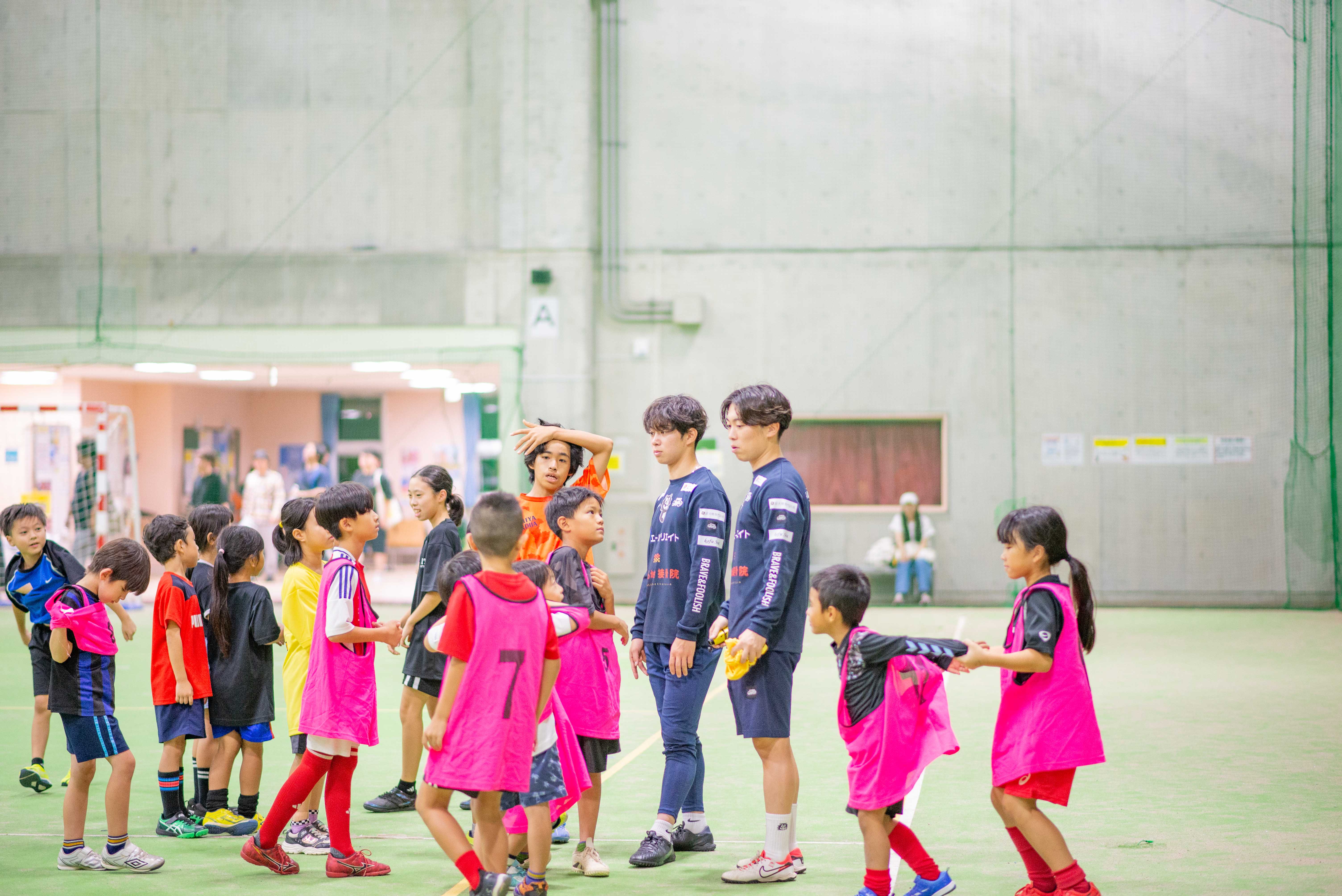 累計参加者2100人突破を記念した集合写真